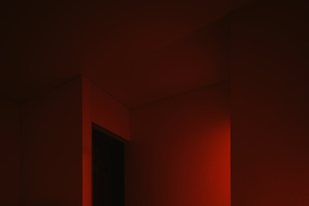 open door in dark room